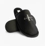 Calvin Klein HOTEL SLIPPER MONOLOGUE Mens Slippers Triple Black side view showing slip-on design and logo.