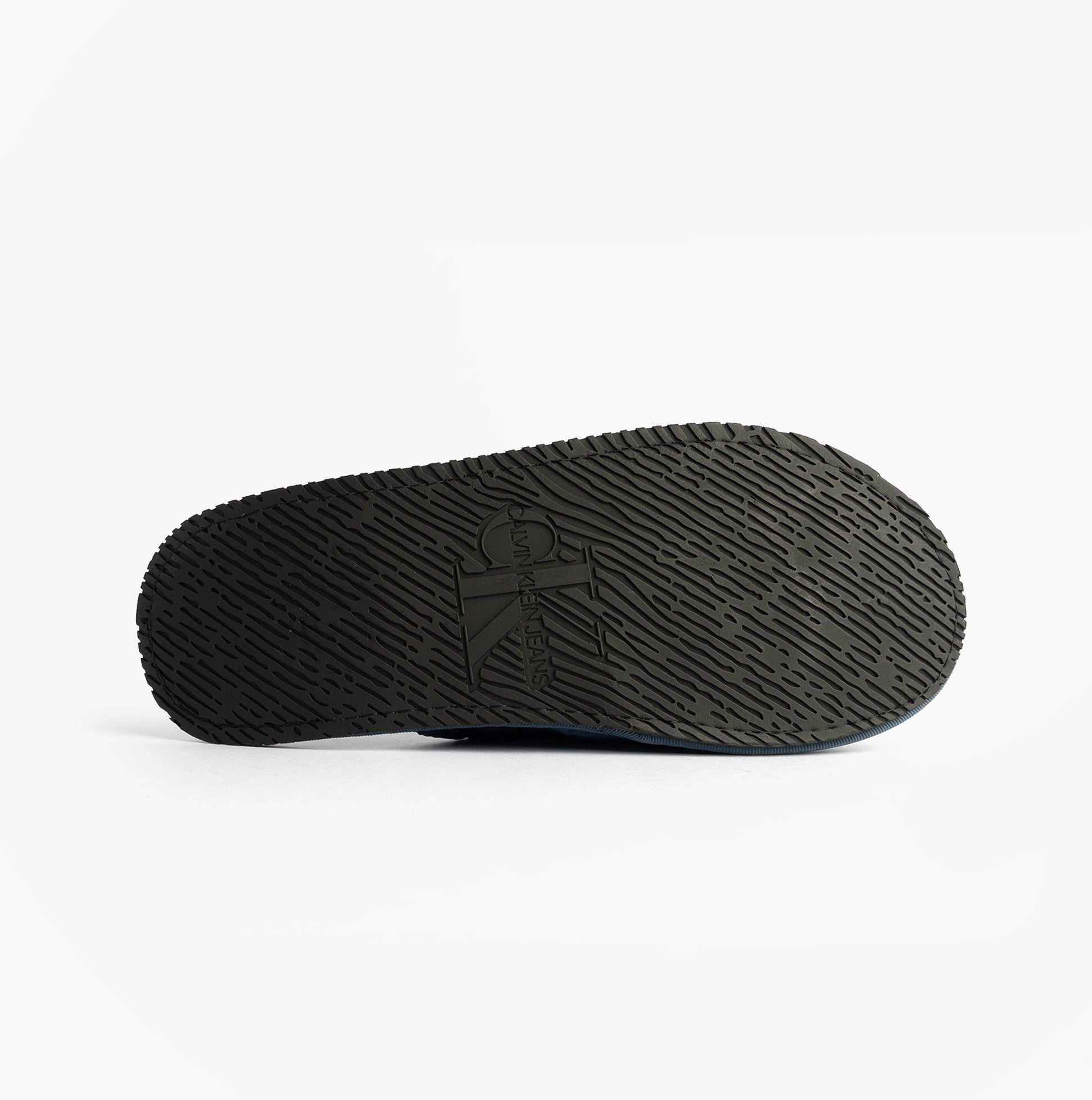 Calvin Klein HOTEL SLIPPER MONOLOGUE Mens Slippers Moonlit Ocean bottom view showing sole texture and logo.