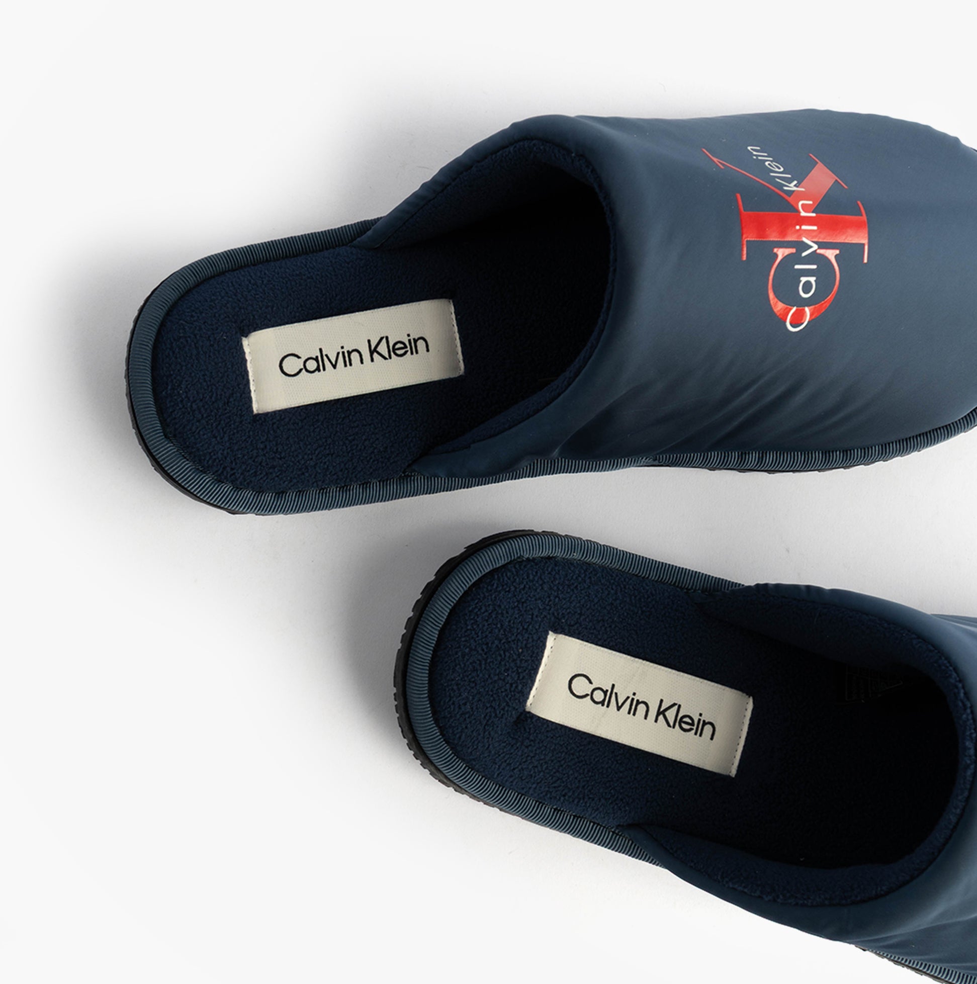 Calvin Klein HOTEL SLIPPER MONOLOGUE Mens Slippers Moonlit Ocean top view showing comfort slip-on design.