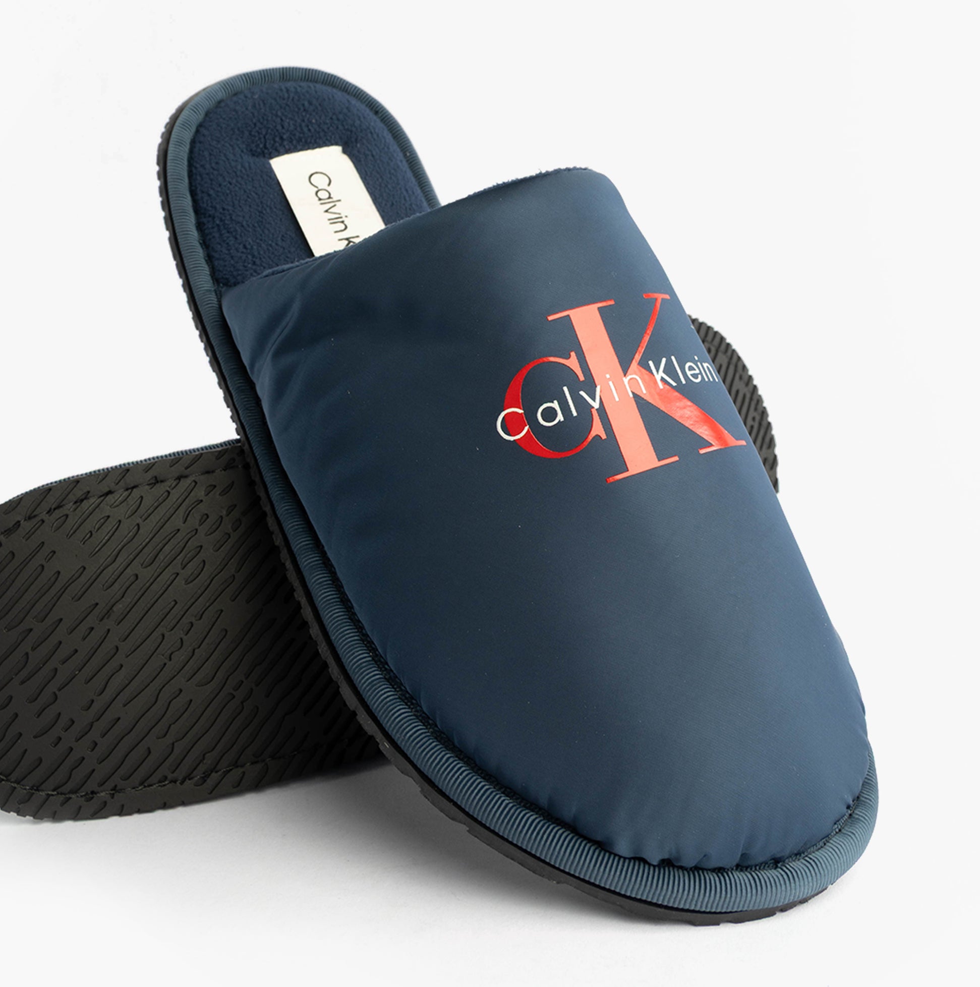 Calvin Klein HOTEL SLIPPER MONOLOGUE Mens Slippers Moonlit Ocean side view with logo on upper and textured sole.