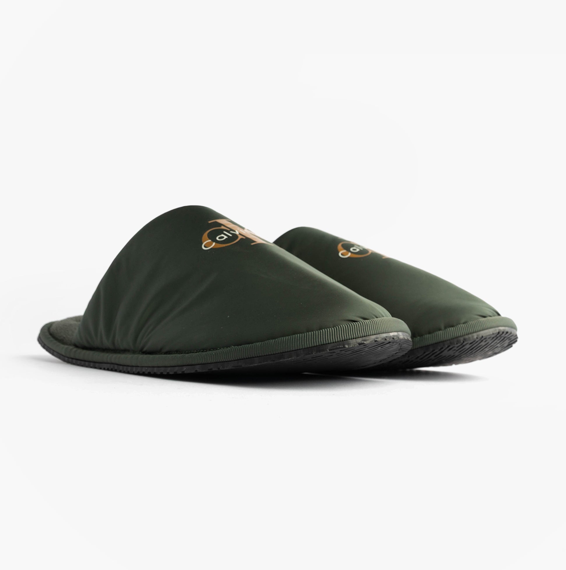 Calvin Klein HOTEL SLIPPER MONOLOGUE Mens Slippers Thyme side view showing slip-on mules with soft green upper.