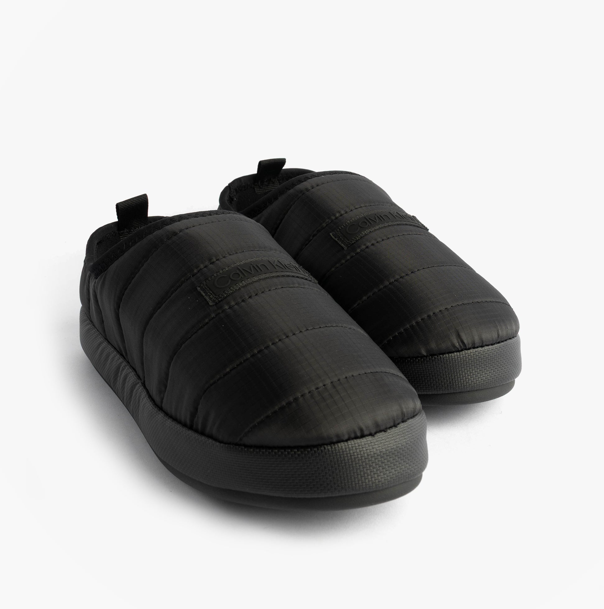 Calvin Klein HOME SLIPPER RIPSTOP Mens Slippers Black side view showcasing soft polyester upper and lightweight design.