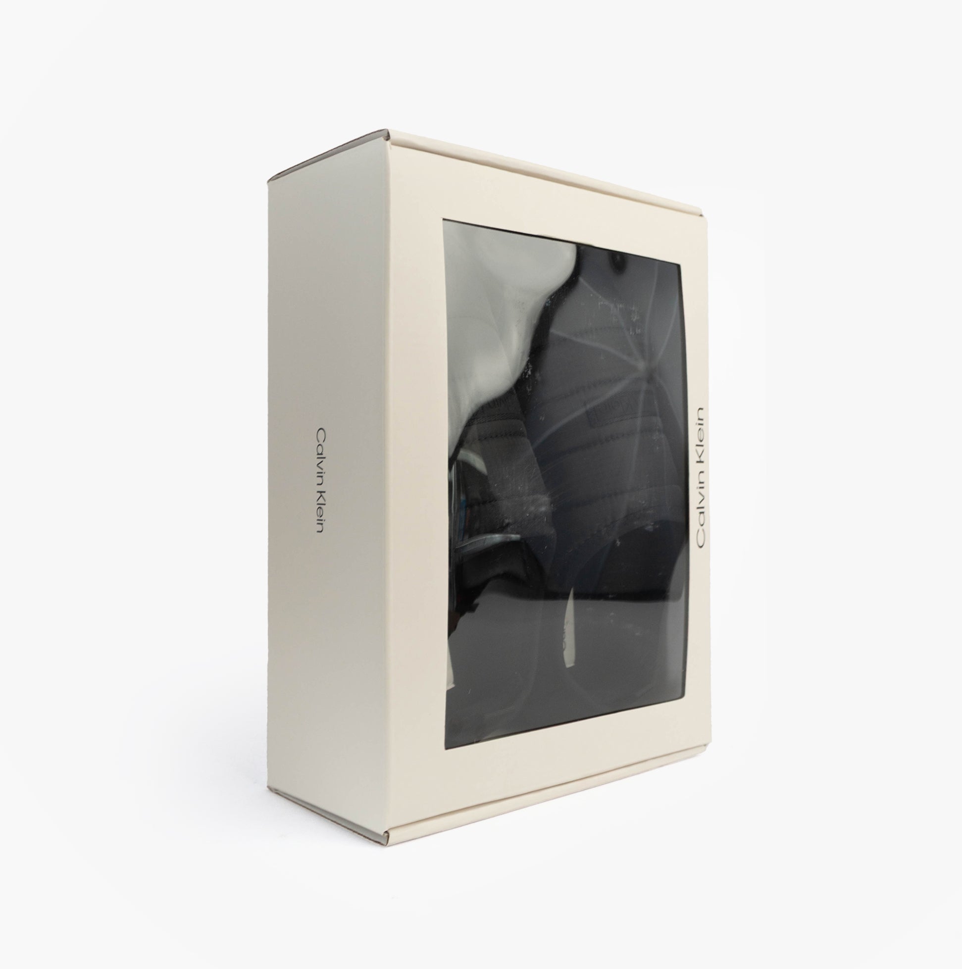 Calvin Klein HOME SLIPPER RIPSTOP Mens Slippers Black in gift box, side view, showcasing the packaging.