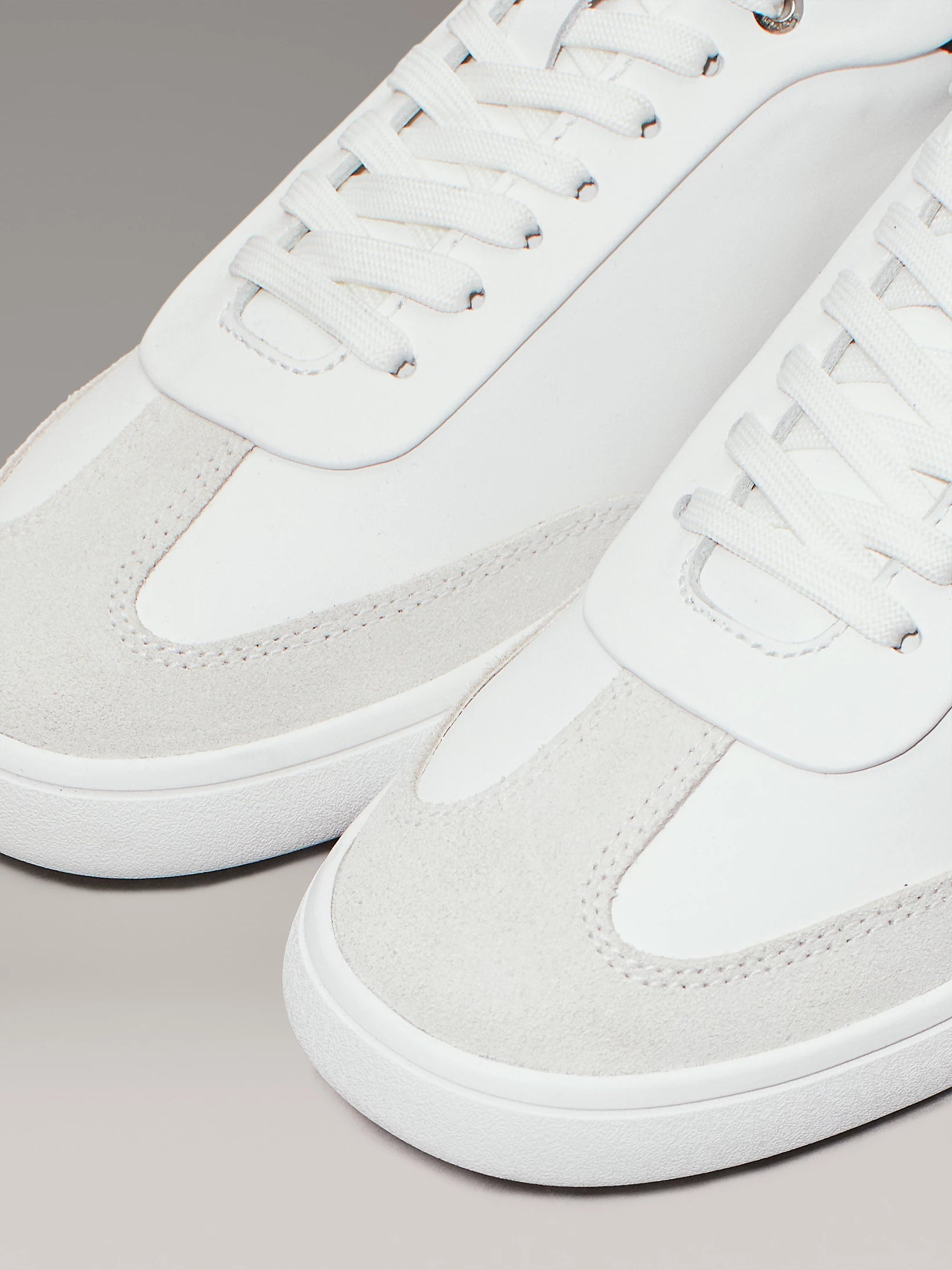 Calvin Klein CUPSOLE LACE UP Womens Trainers Bright White/Black detail view featuring leather and textile material.