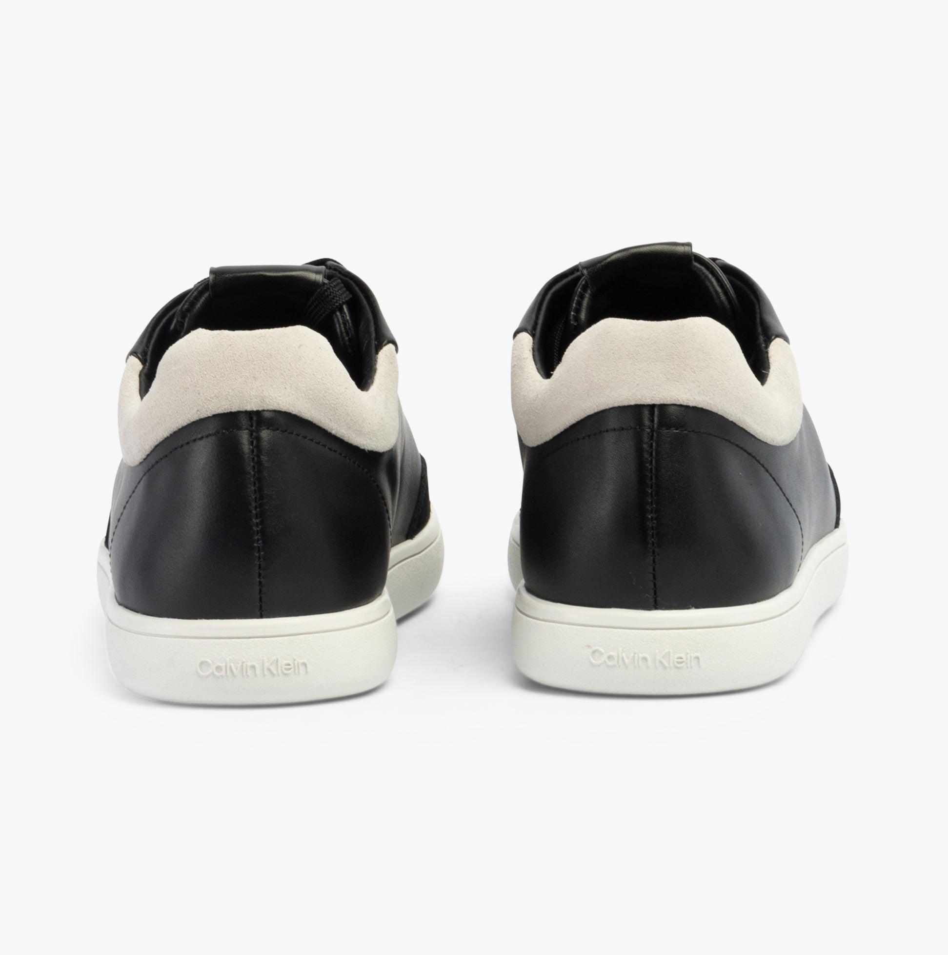 Calvin Klein CUPSOLE LACE UP Womens Trainers Black/White rear view showing the leather upper and low top design.