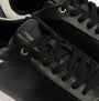 Calvin Klein CUPSOLE LACE UP Womens Trainers Black/White detail view highlighting the leather upper and lace-up closure.