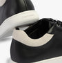 Calvin Klein CUPSOLE LACE UP Womens Trainers Black/White, side view showing smooth leather upper and textured heel detail.