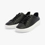 Calvin Klein VULCANISED LACE UP Womens Trainers Black / White side view showcasing casual leather design with lace-up closure.