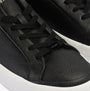 Calvin Klein VULCANISED LACE UP Womens Trainers Black / White close-up view of textured leather upper and laces.