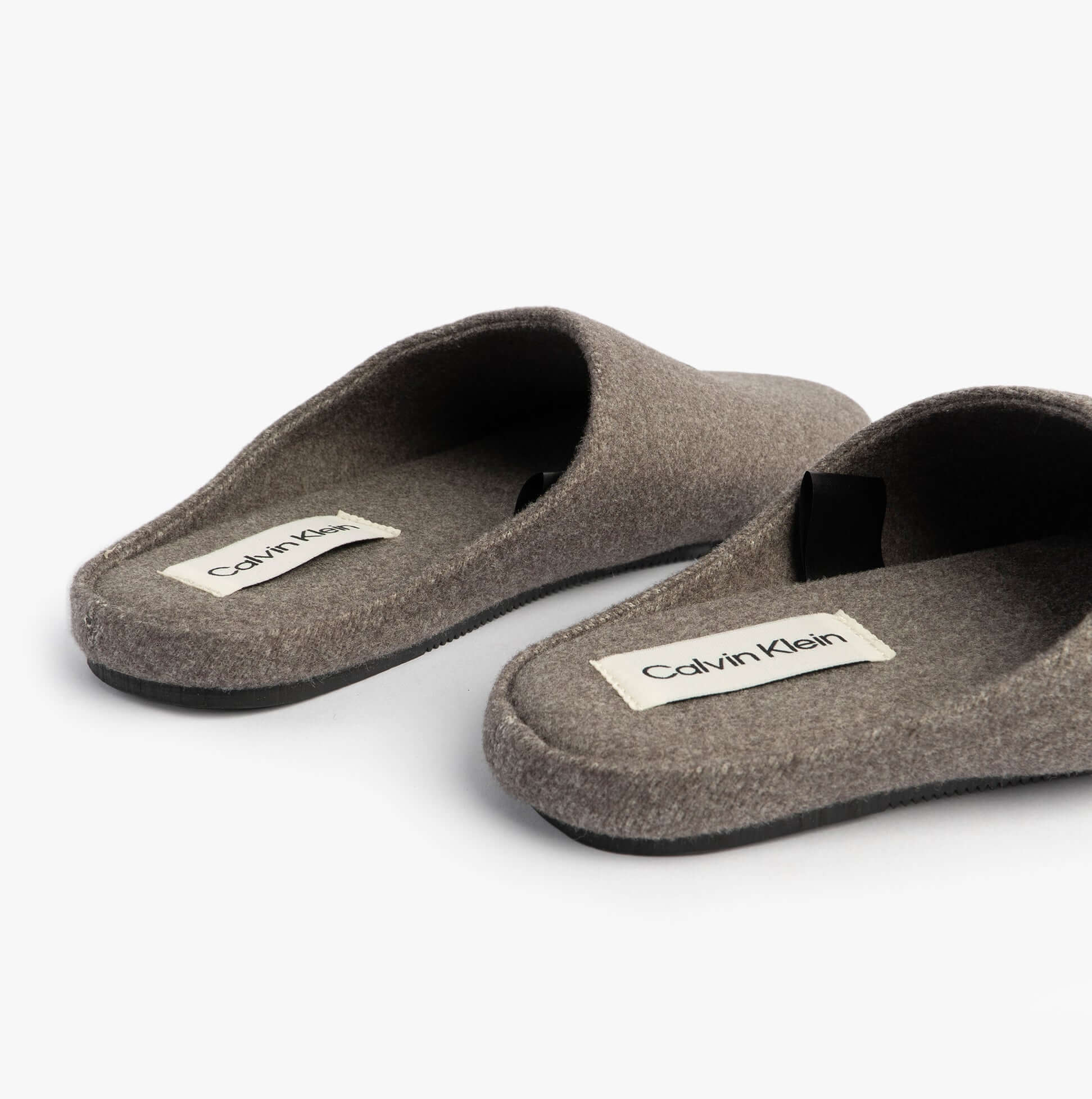 Calvin Klein Mens HOME Felt Signature Logo Mule Slippers Grey, side view showcasing softness and logo detail.