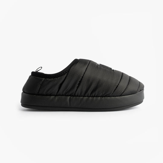 Calvin Klein HOME SLIPPER NYL PAT Womens Slippers Black side view showcasing soft polyester upper and lightweight design.