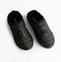 Calvin Klein HOME SLIPPER NYL PAT Womens Slippers Black top view showing stylish design and comfortable fit.