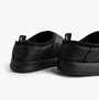 Calvin Klein HOME SLIPPER NYL PAT Womens Slippers Black rear view showing soft polyester upper and flat sole.
