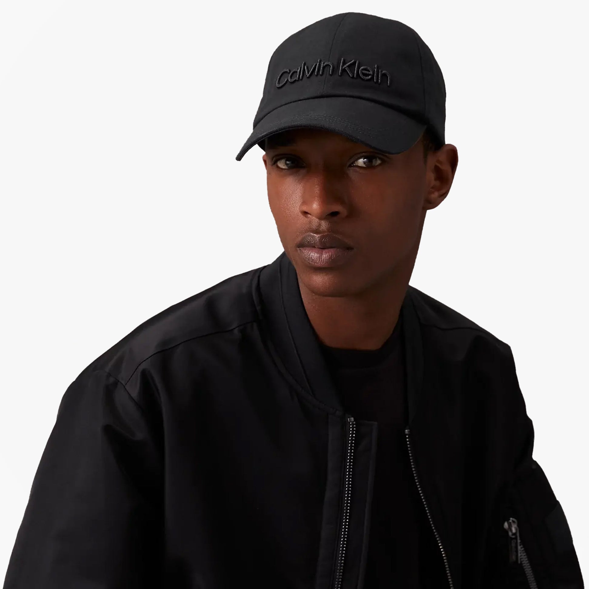 Calvin Klein CALVIN EMBROIDERY BB CAP Mens Baseball Cap Black worn by model, front view highlighting embroidered logo.
