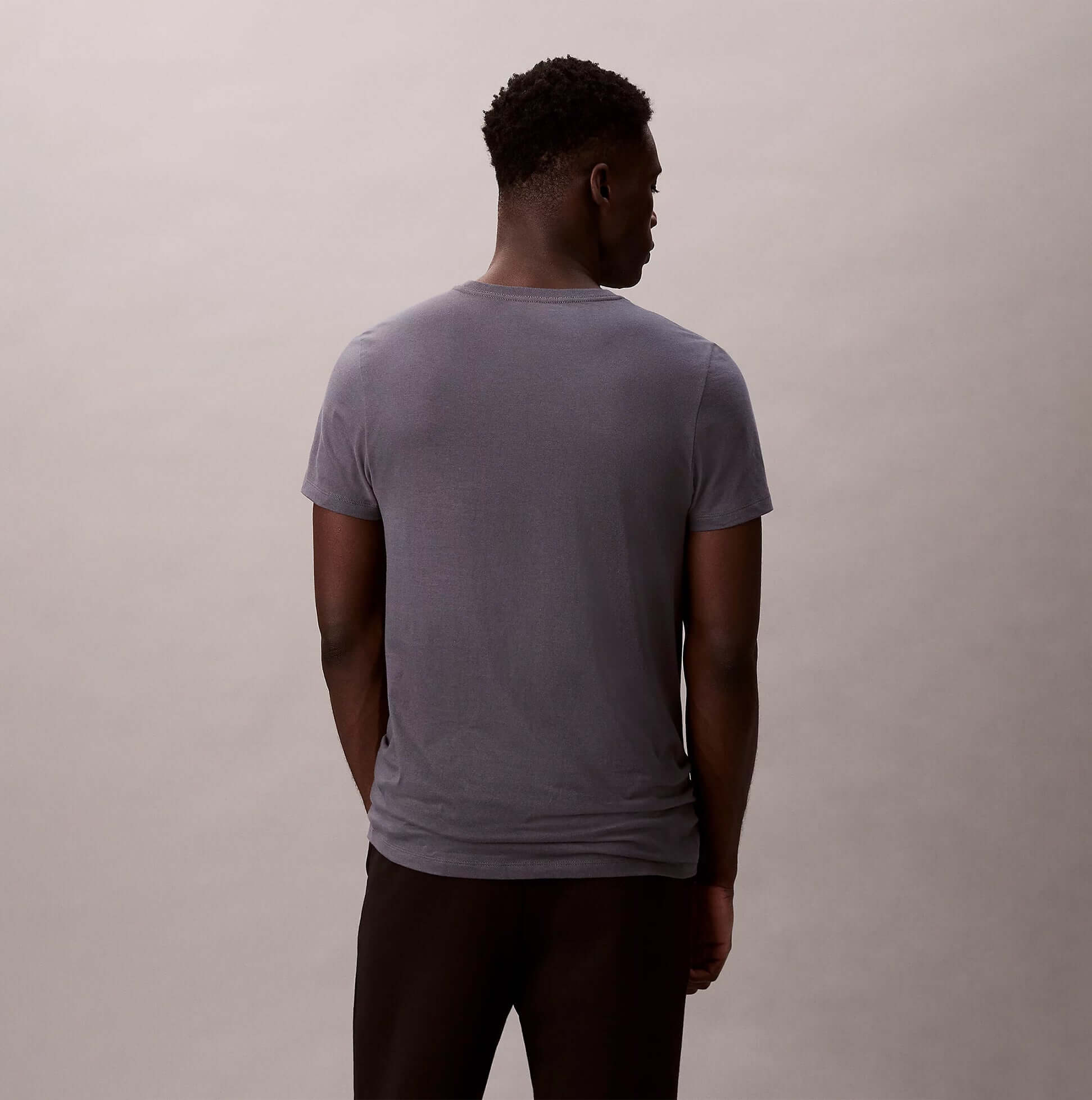 Calvin Klein S/S CREW NECK 3 PACK Mens T-Shirts & Tank Tops Multicoloured, back view of grey t-shirt on model.