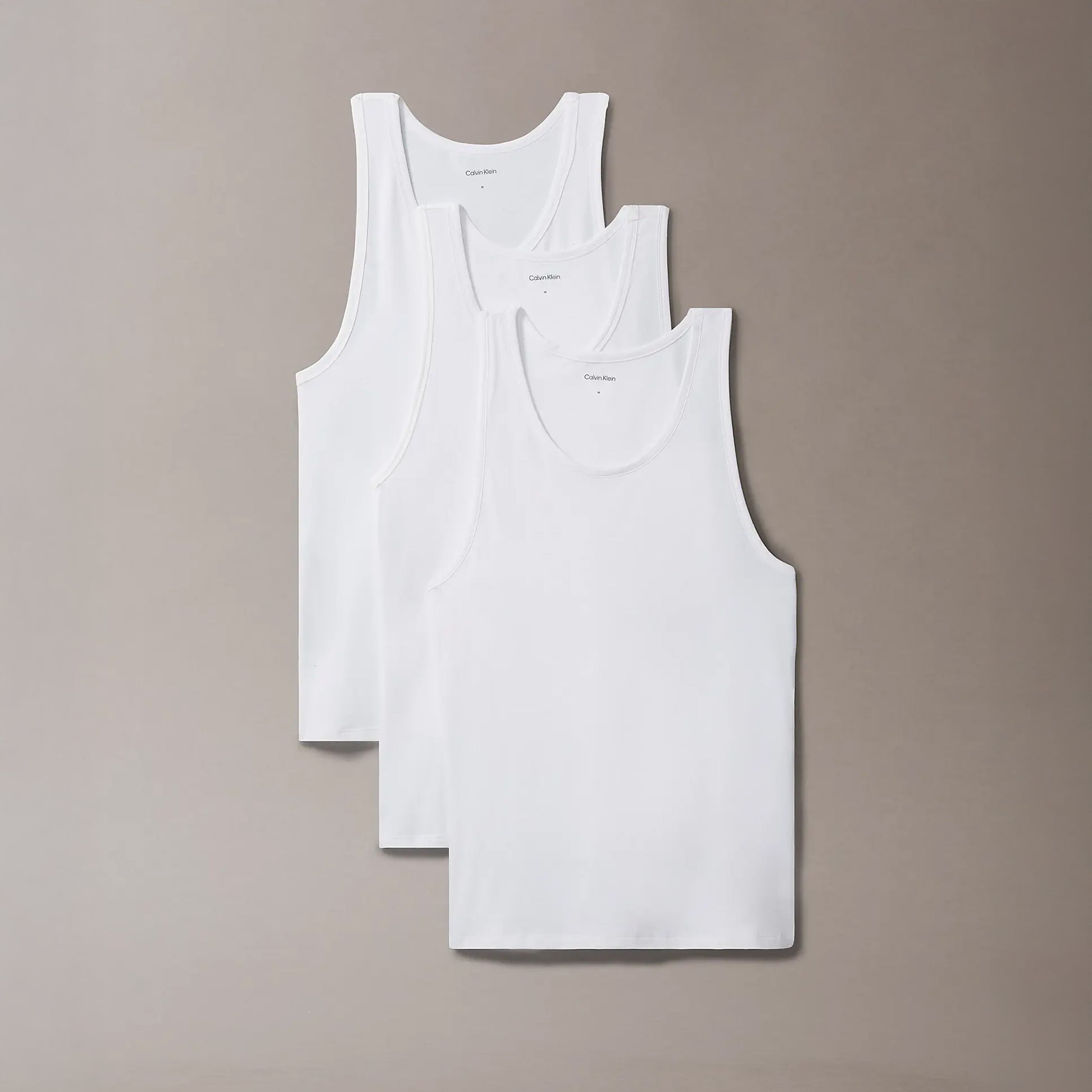 Calvin Klein 3 Pack Mens Lounge Tank Tops White, front view showcasing three sleeveless white vests.