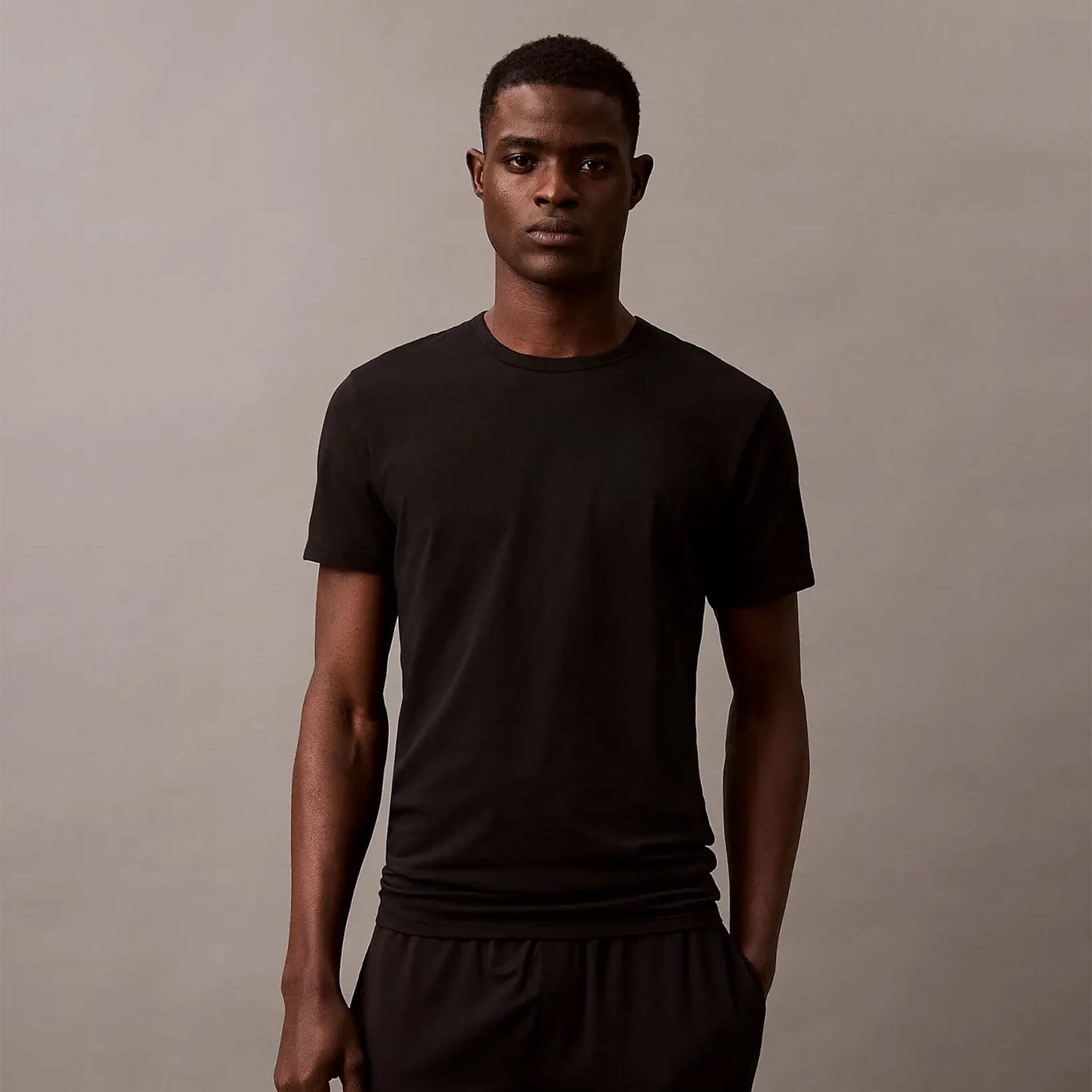 Calvin Klein MICRO STRETCH 3 Pack Mens T-Shirts Black front view model wearing black t-shirt.