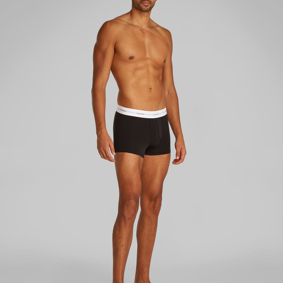 Calvin Klein COTTON 3 Pack Mens Trunks Black side view, featuring medium rise waist and CK signature waistband.