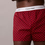 Calvin Klein BOXER SLIM 3 Pack Mens Cotton Stretch Multicoloured side view of red patterned boxers with logo waistband.