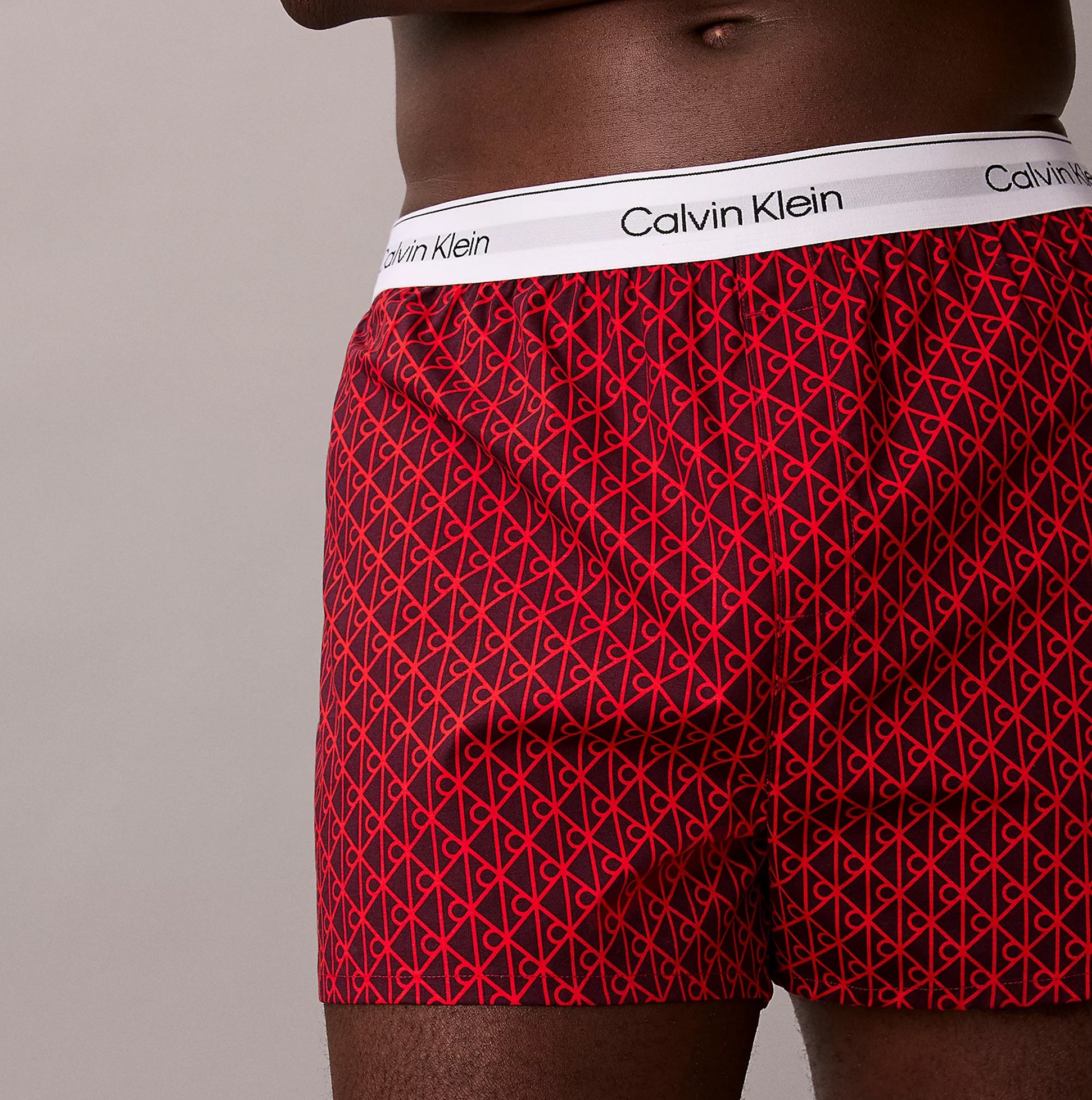 Calvin Klein BOXER SLIM 3 Pack Mens Cotton Stretch Multicoloured side view of red patterned boxers with logo waistband.