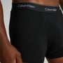 Calvin Klein ICON Cotton Stretch 3 Pack Dart Trunks Black side view showing CK signature waistband and soft cotton fabric.