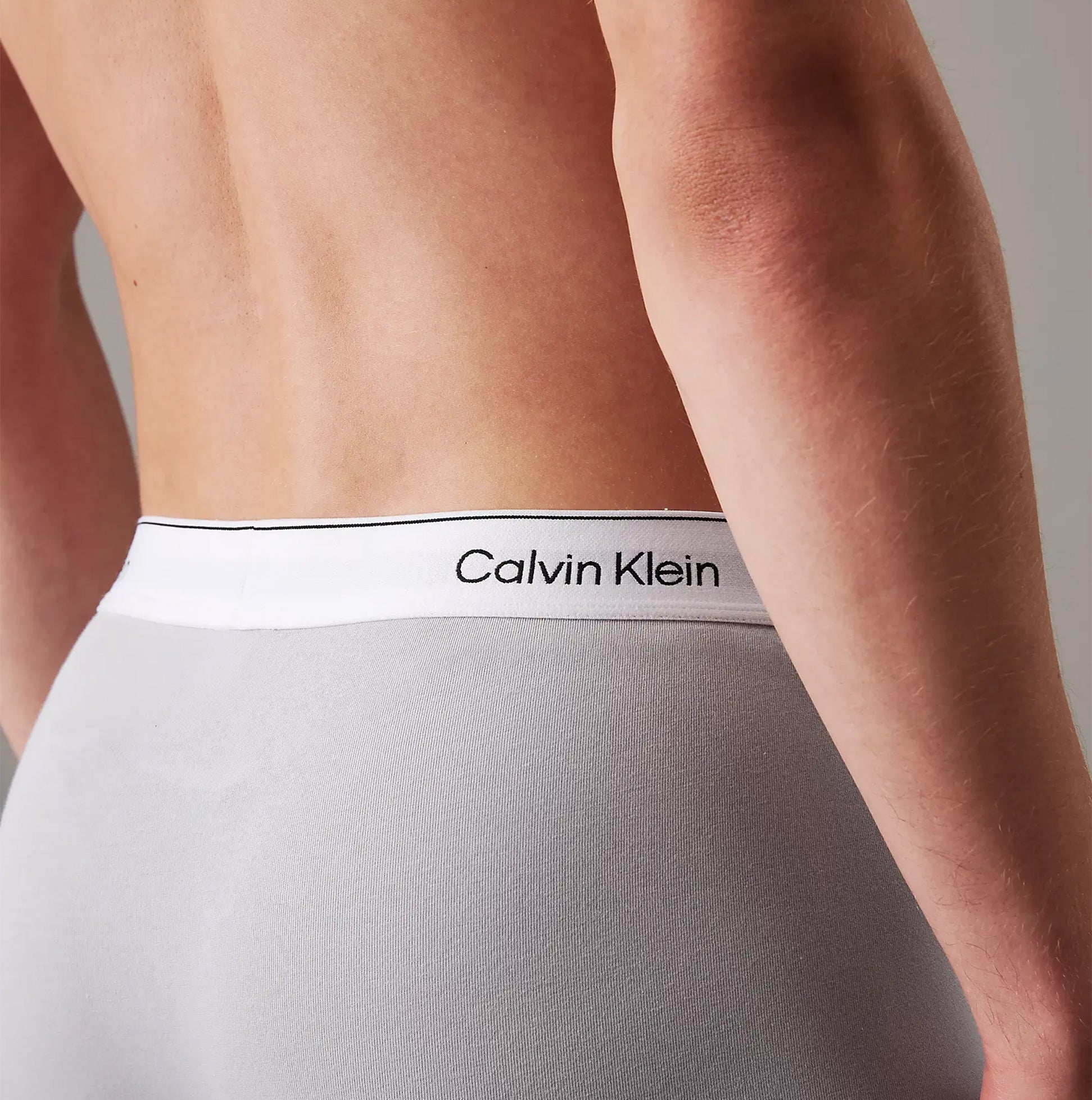 Calvin Klein TRUNK 3 Pack Mens Multicoloured detail view showing flexible logo waistband and soft fabric.