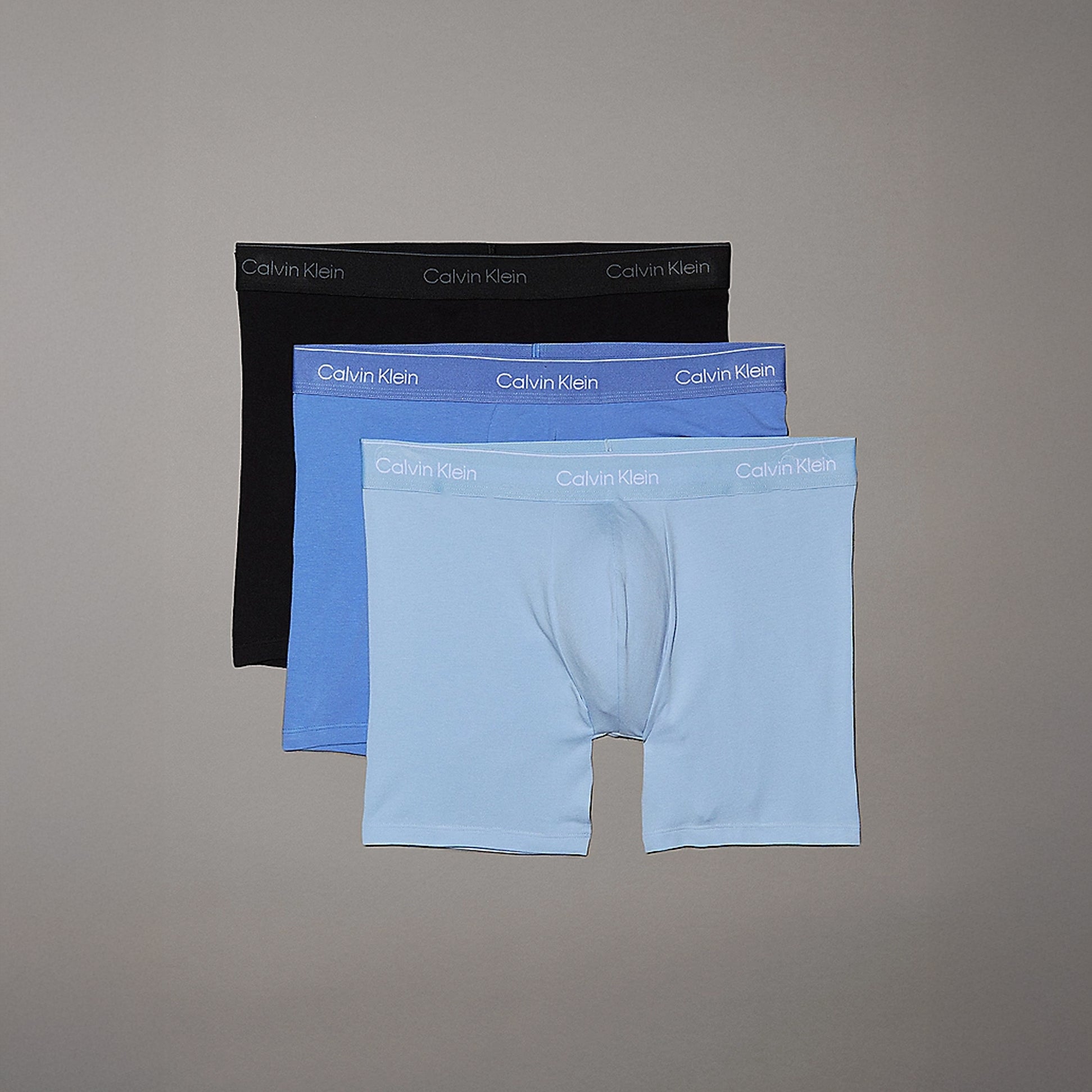 Calvin Klein ICON COTTON STRETCH 3 Pack Mens Boxer Briefs Black/Glacier/Blue front view showcasing three colors.