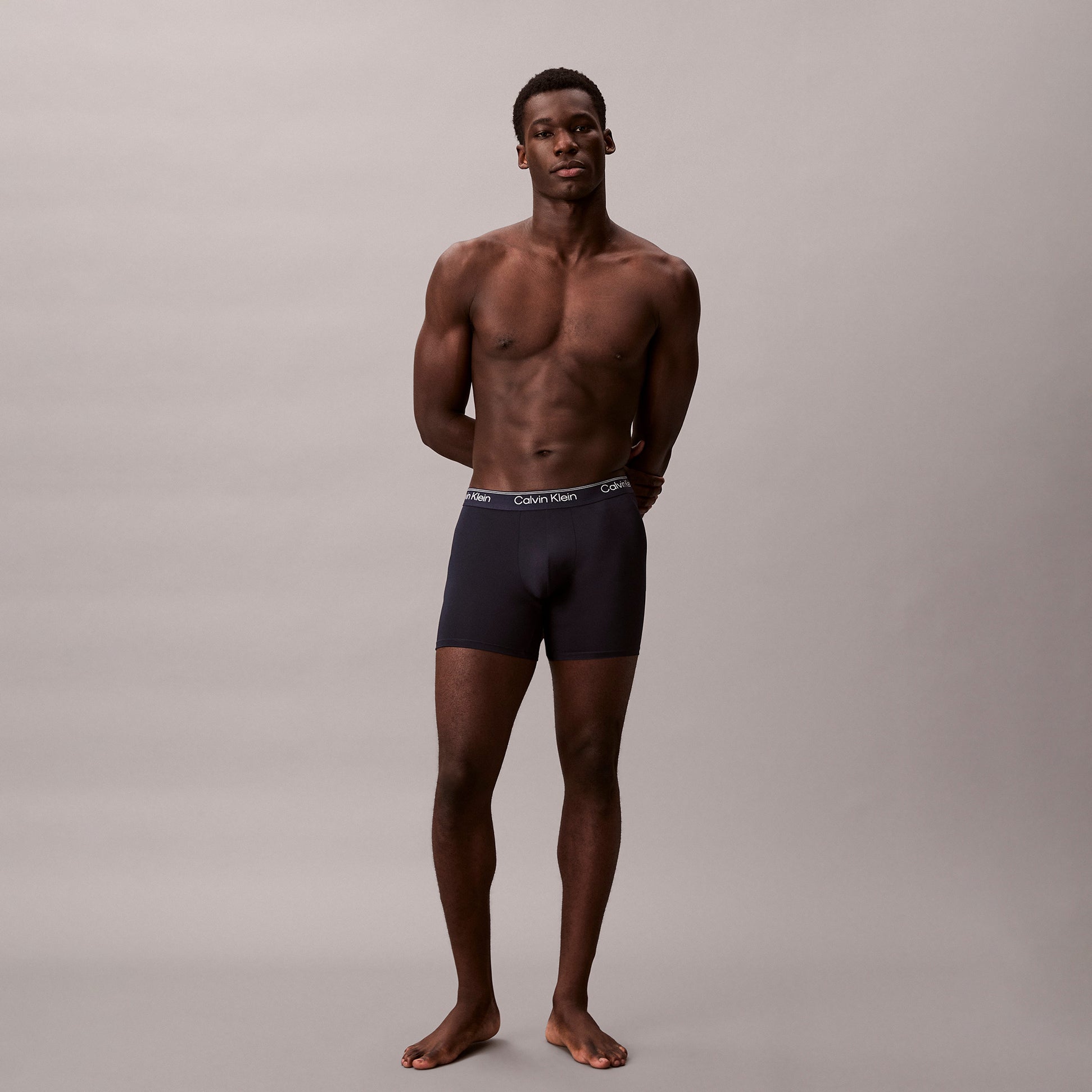 Calvin Klein BOXER BRIEF 3 Pack Mens Microfibre Stretch Multicoloured side view model wearing dark boxer briefs.