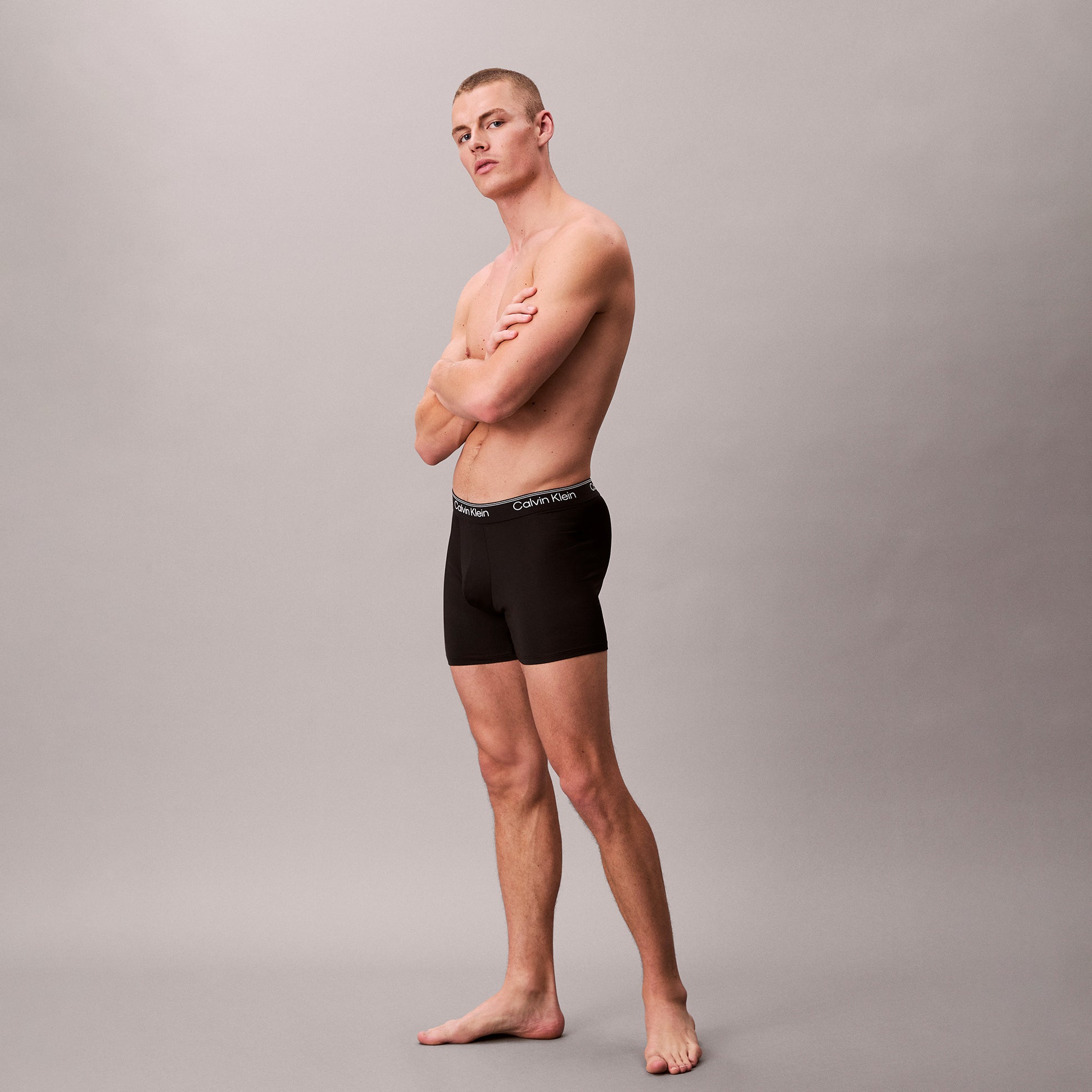 Calvin Klein BOXER BRIEF 3 Pack Mens Microfibre Stretch Black side view model wearing black boxer briefs