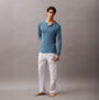Calvin Klein ULTRA SOFT MODAL Mens Pyjama Top Deck Gray front view, model wearing long-sleeve top and striped pants.