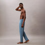 Calvin Klein SLEEP PANT Mens Deck Gray side view, fitted elastic waist joggers in light gray, model standing barefoot.
