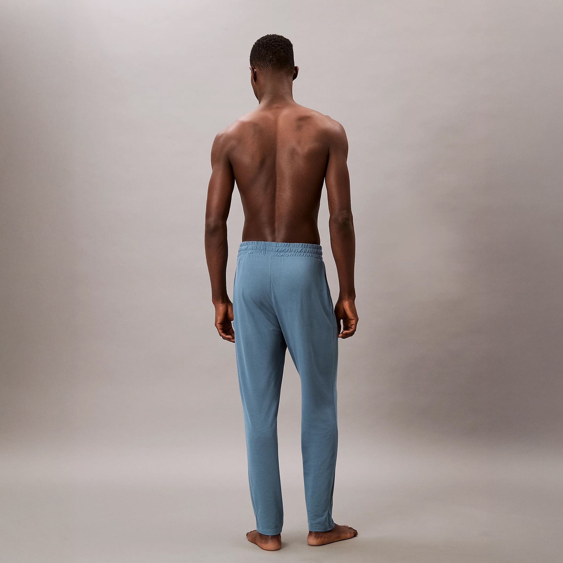 Calvin Klein SLEEP PANT Mens Deck Gray back view showing elastic waist and tapered leg design.
