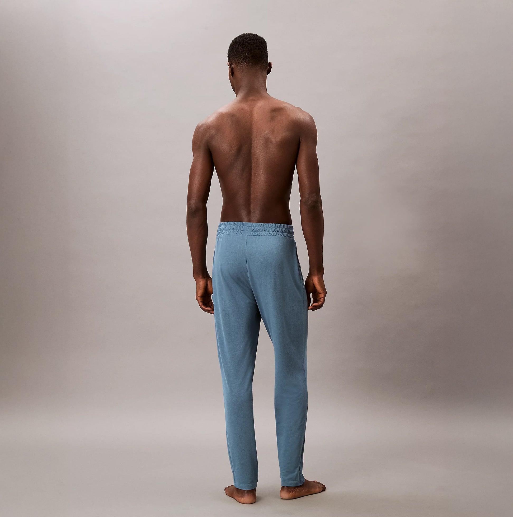 Calvin Klein SLEEP PANT Mens Deck Gray back view showing elastic waist and tapered leg design.