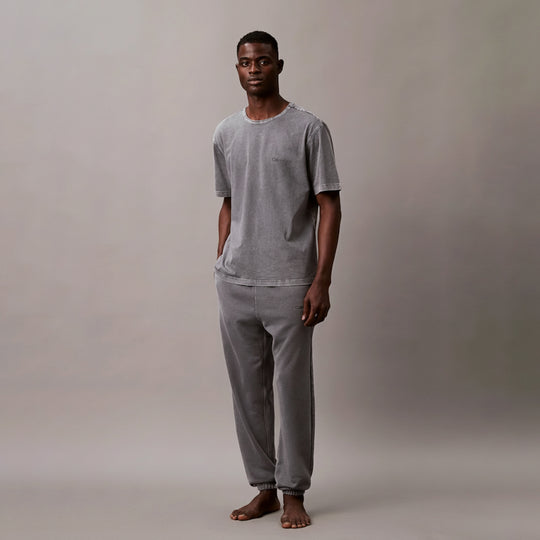 Calvin Klein 100% COTTON Mens Lounge T-Shirt Forged Iron front view on model, showing crew neckline and chest pocket.