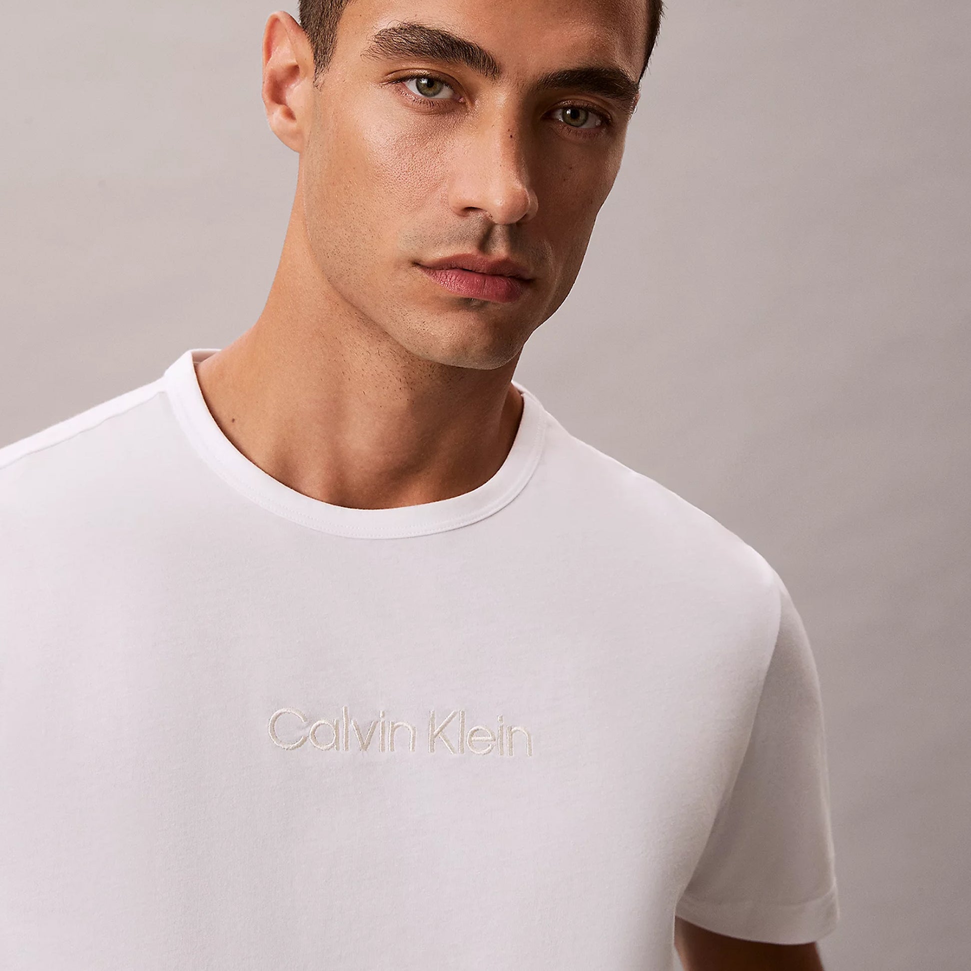 Calvin Klein SHORT Mens Pyjama Set Multicoloured front view model wearing white shirt with embroidered logo.