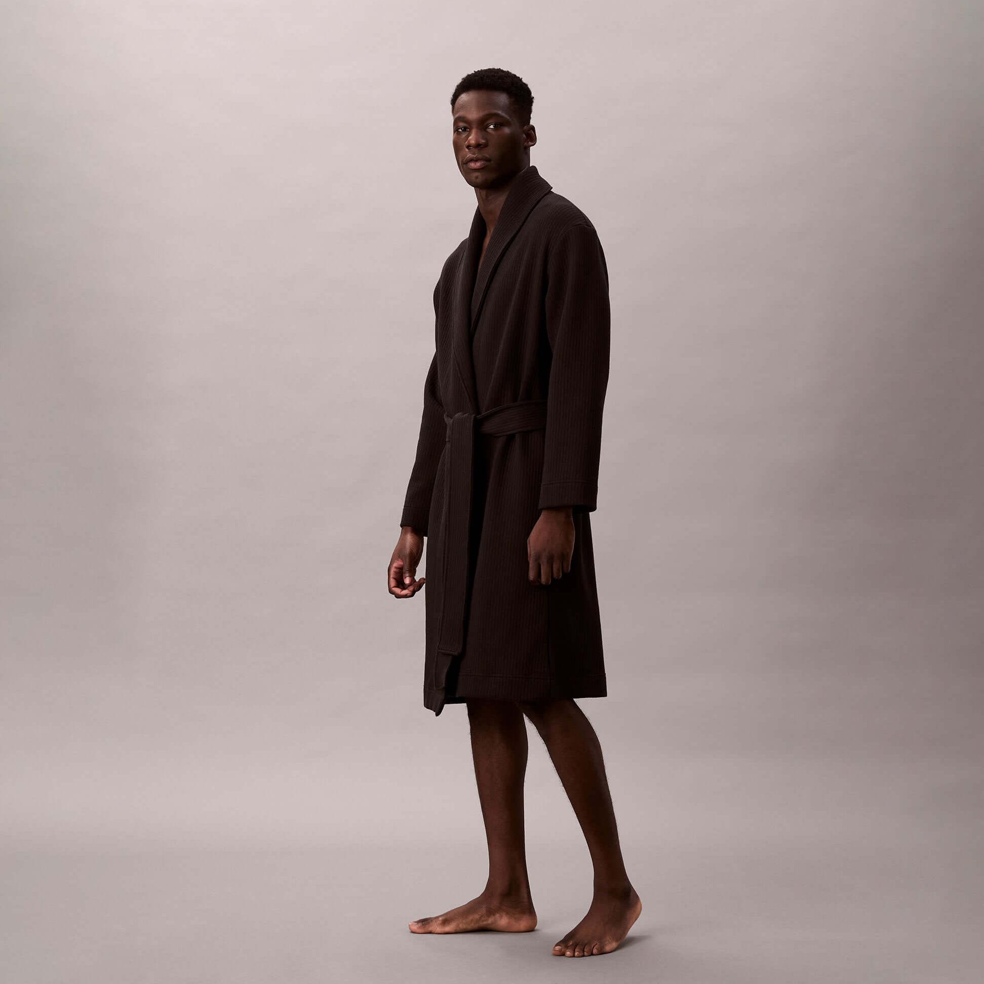 Calvin Klein QUILTED ROBE Mens Bathrobes Black side view of model wearing robe