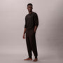 Calvin Klein QUILTED JOGGER Mens Joggers Black side view model wearing black joggers and top