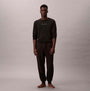Calvin Klein QUILTED JOGGER Mens Joggers Black front view on model wearing matching top.