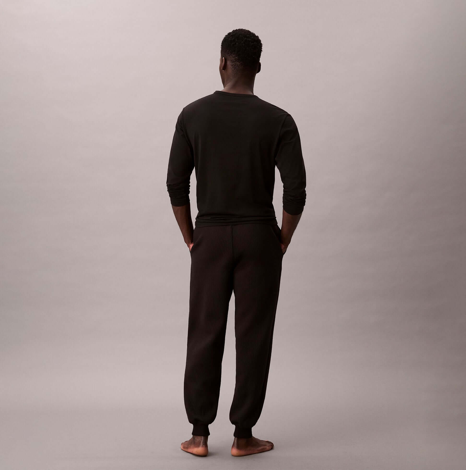 Calvin Klein QUILTED JOGGER Mens Joggers Black back view, regular fit, 60% cotton, 40% polyester.