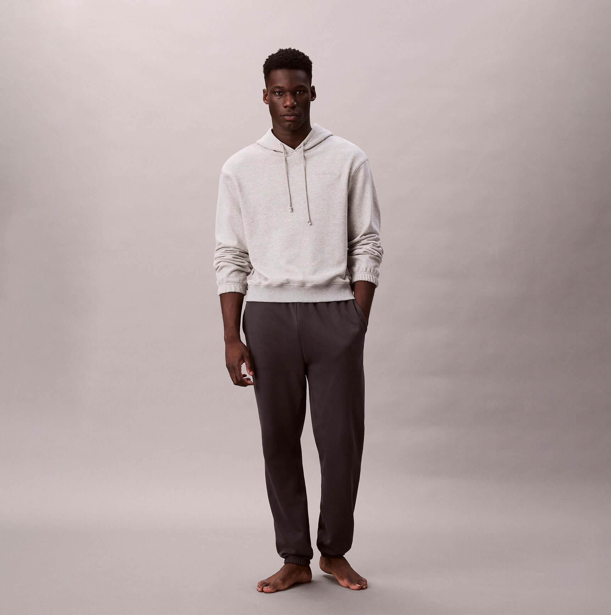 Calvin Klein L/S HOODIE Mens Hoodie Grey Heather front view, model wearing, relaxed fit, casual style.