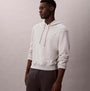 Calvin Klein L/S HOODIE Mens Hoodie Grey Heather side view on model in casual setting.