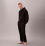 Calvin Klein L/S HOODIE Mens Hoodie Black front view, model wearing relaxed fit black hoodie and matching pants.