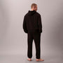 Calvin Klein L/S HOODIE Mens Hoodie Black back view on a model wearing black sweatpants.