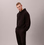 Calvin Klein JOGGER Mens Black front view model wearing black joggers and hoodie.