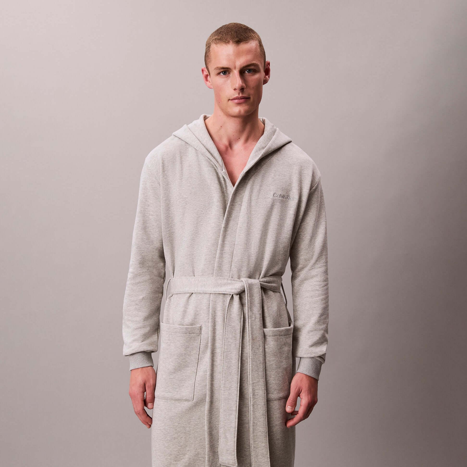 Calvin Klein HOODED ROBE Mens Bathrobes Grey Heather front view showcasing the soft fabric and hood design.