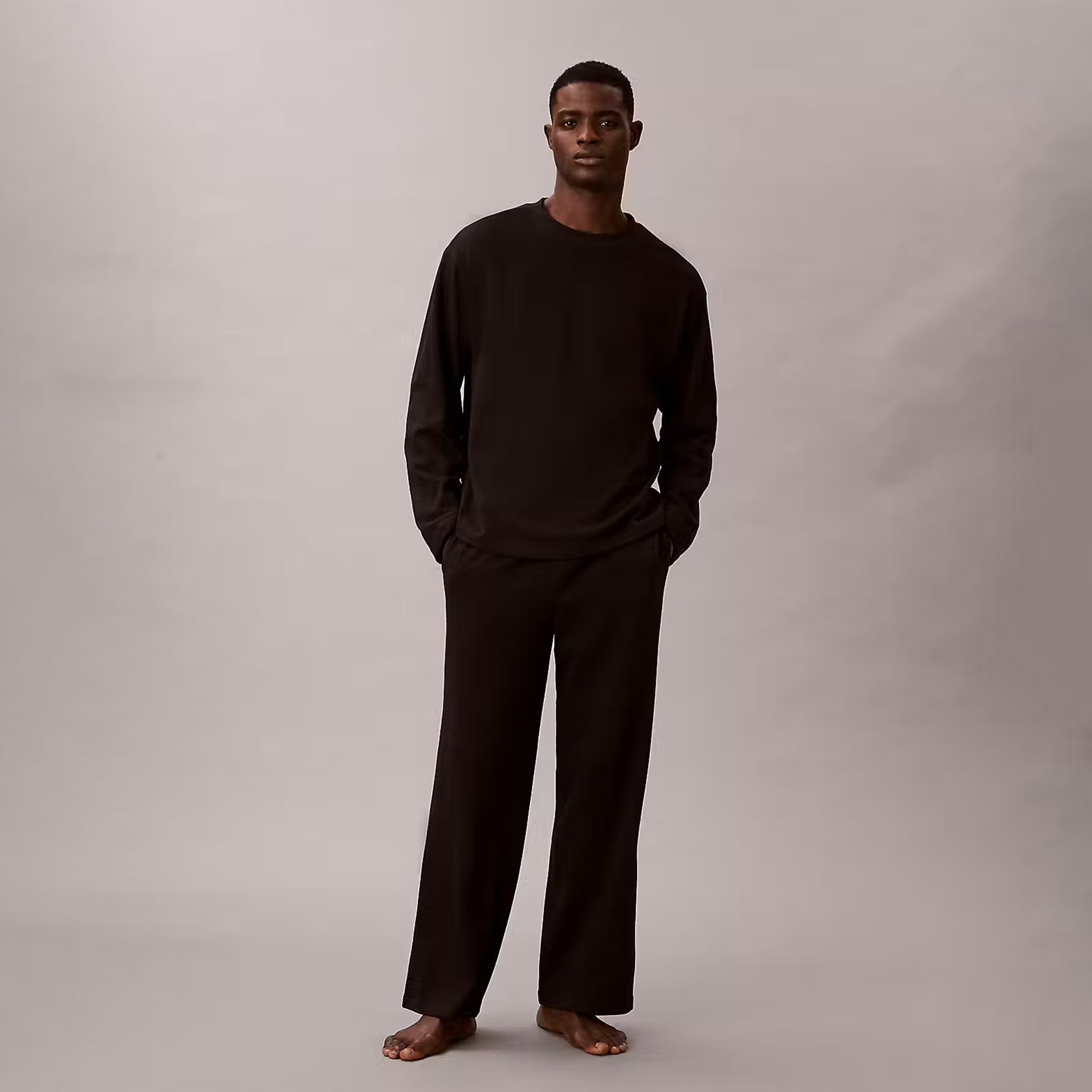 Calvin Klein LS TEE PANT SET Mens Black front view featuring long sleeves and relaxed fit, made from 100% cotton.