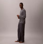 Calvin Klein LS TEE PANT SET Mens Multicoloured side view featuring a model in a long sleeve tee and striped pants.