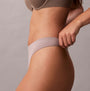 Calvin Klein Bonded Flex Seamless 3 Pack Thong Multi side view highlighting the soft elastic waistband and seamless design.