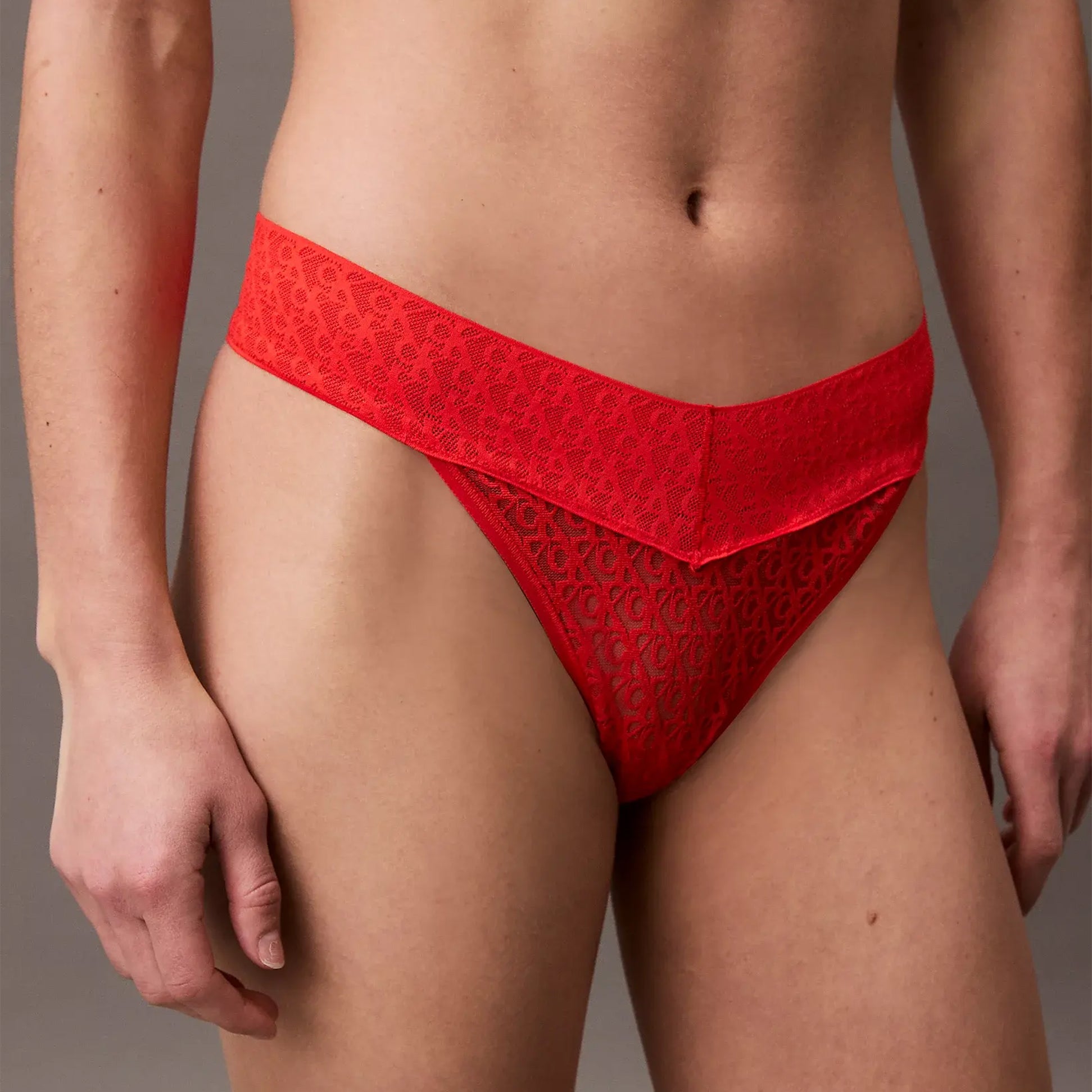 Calvin Klein THONG Womens Icon Logo Lace Molten Red front view showcasing red lace design and comfortable fit.