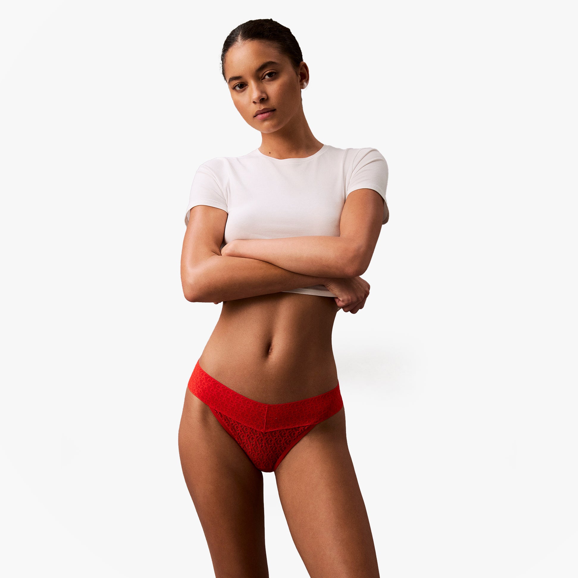 Calvin Klein ICON LOGO Low Rise Womens Bikini Briefs Molten side view model wearing red lingerie with white shirt